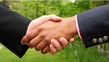 Personal Bankruptcy Attorney Shaking Hands with Client